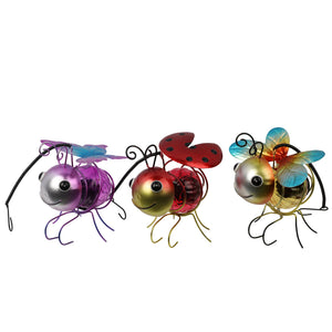metal bug with solar wall hanging